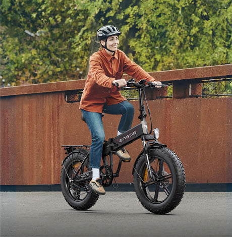 a lady riding a cheap electric bike
